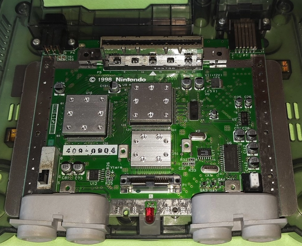 Otherwise, you'll have to remove the top shell. The revision (not visible here) is printed behind the cartridge connector (at the top of the picture). Otherwise, you'll have to remove the top shell. The revision (not visible here) is printed behind the cartridge connector (at the top of the picture).