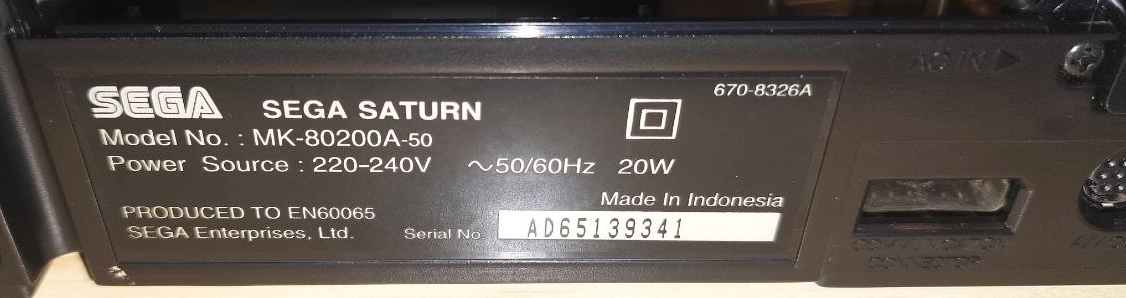 The back of a Sega Saturn, showing the label with the serial number. This one's a VA5 from 1996. The back of a Sega Saturn, showing the label with the serial number. This one's a VA5 from 1996.
